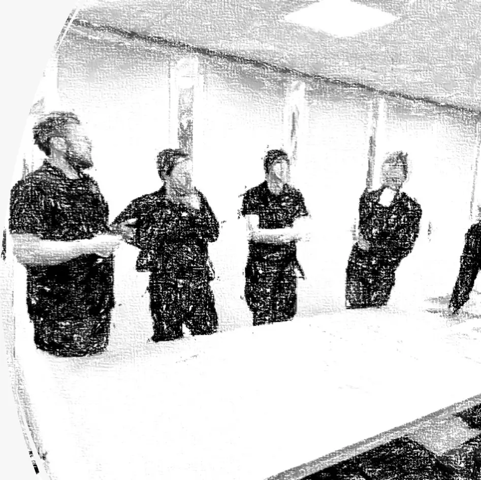 Operations team reviewing improvement results